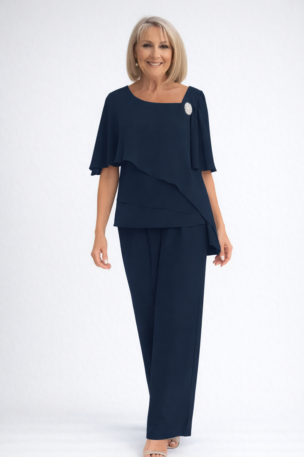 Light blue women's elegant cape top & straight leg trousers. Perfect two-piece outfit for wedding guests.