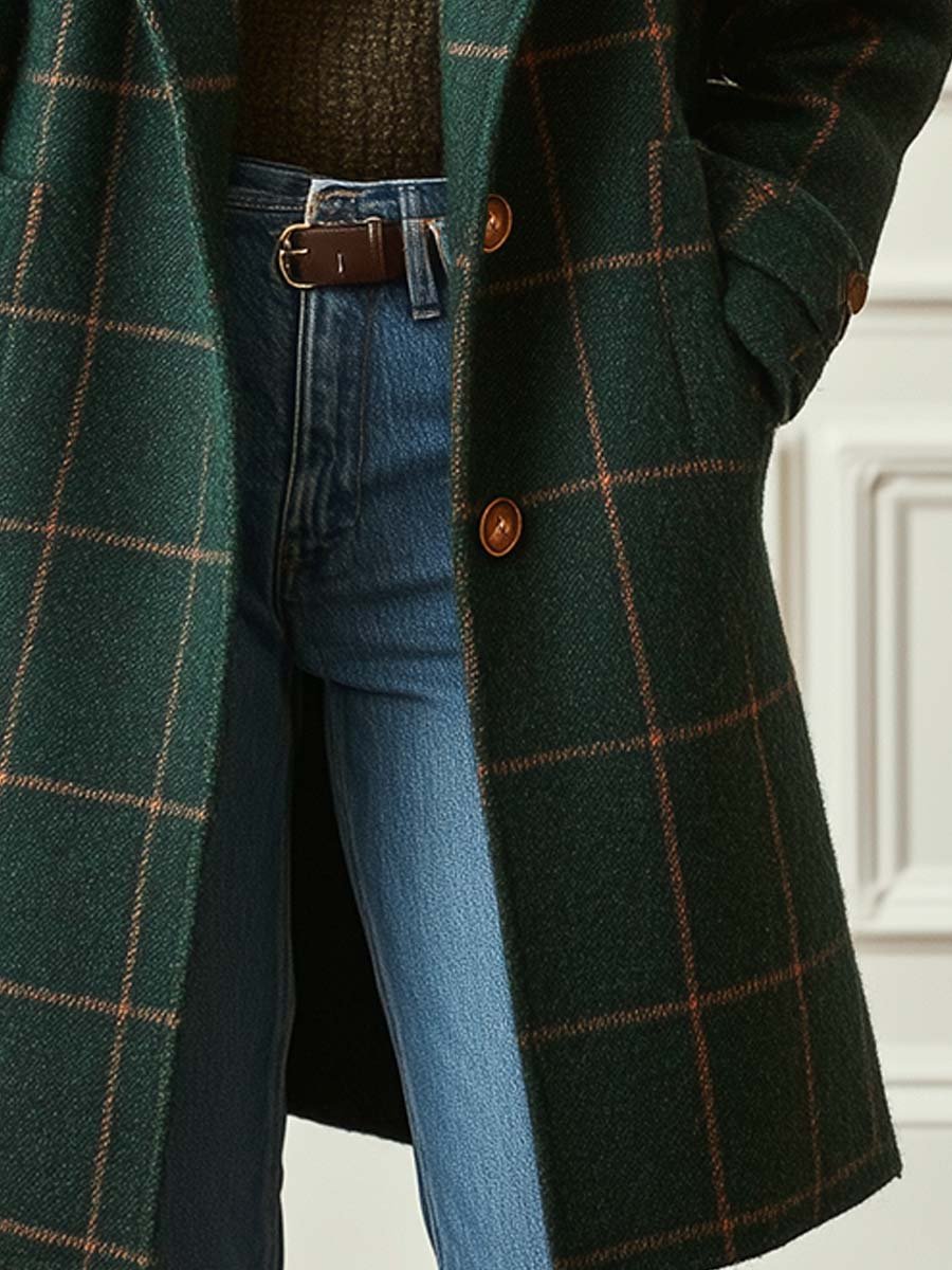 Vintage-style women's structured checkered lapel coat. Elegant fall/winter outerwear, perfect for a sophisticated look.