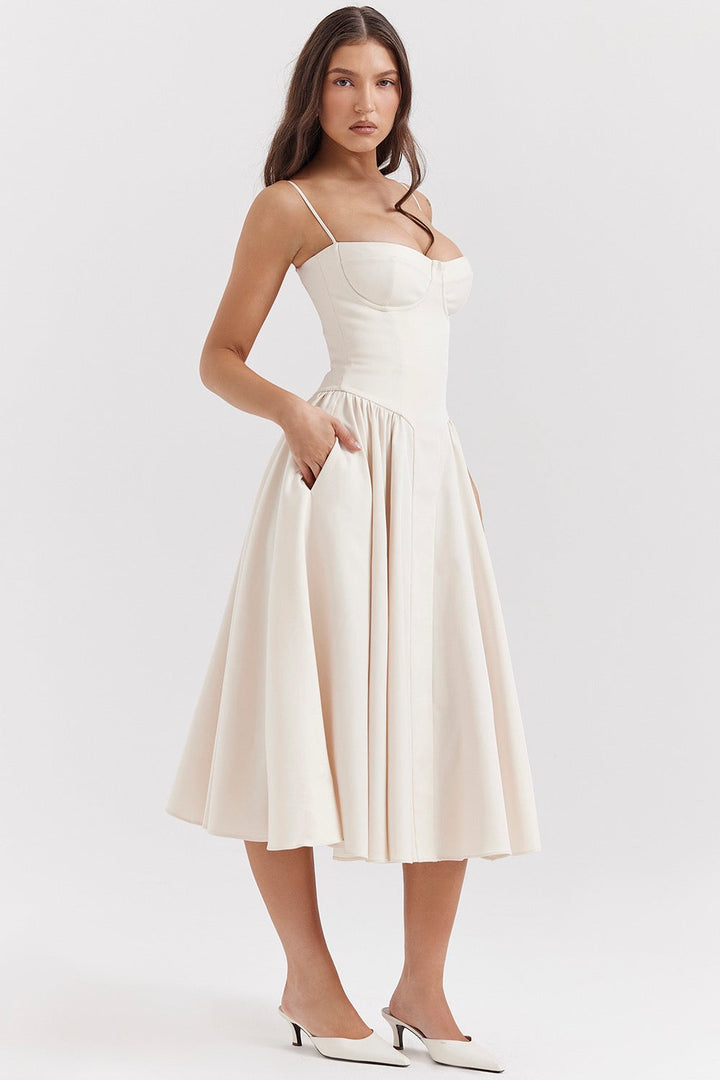 Stylish women's occasion wear: A-line midi corset dress. Elegant & flattering for wedding guests & cocktail parties.