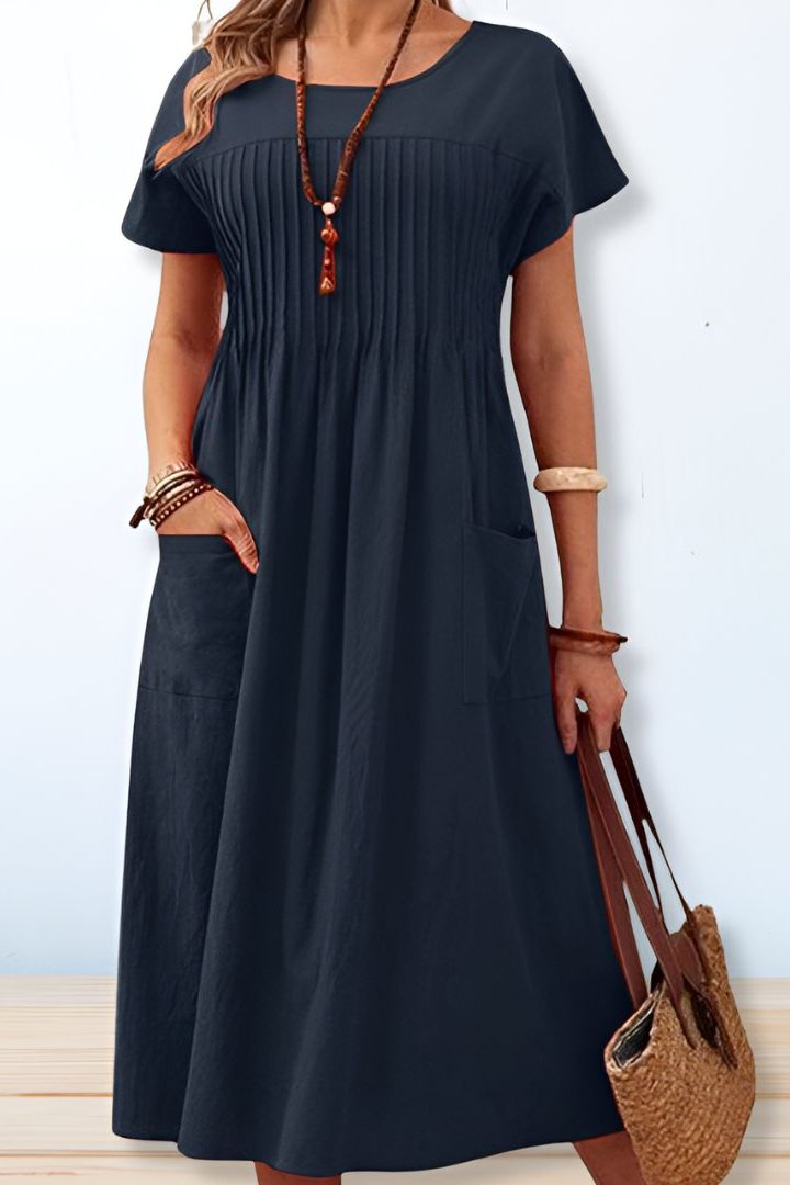 Classic A-line midi dress for women, elegant and flattering. Versatile women's fashion for daily or special wear.