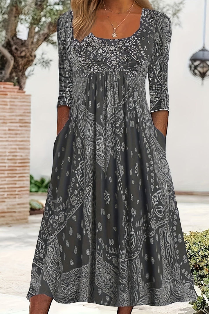 Elegant women's classic A-line midi dress, perfect for versatile day to evening wear. Flattering fit, comfortable.