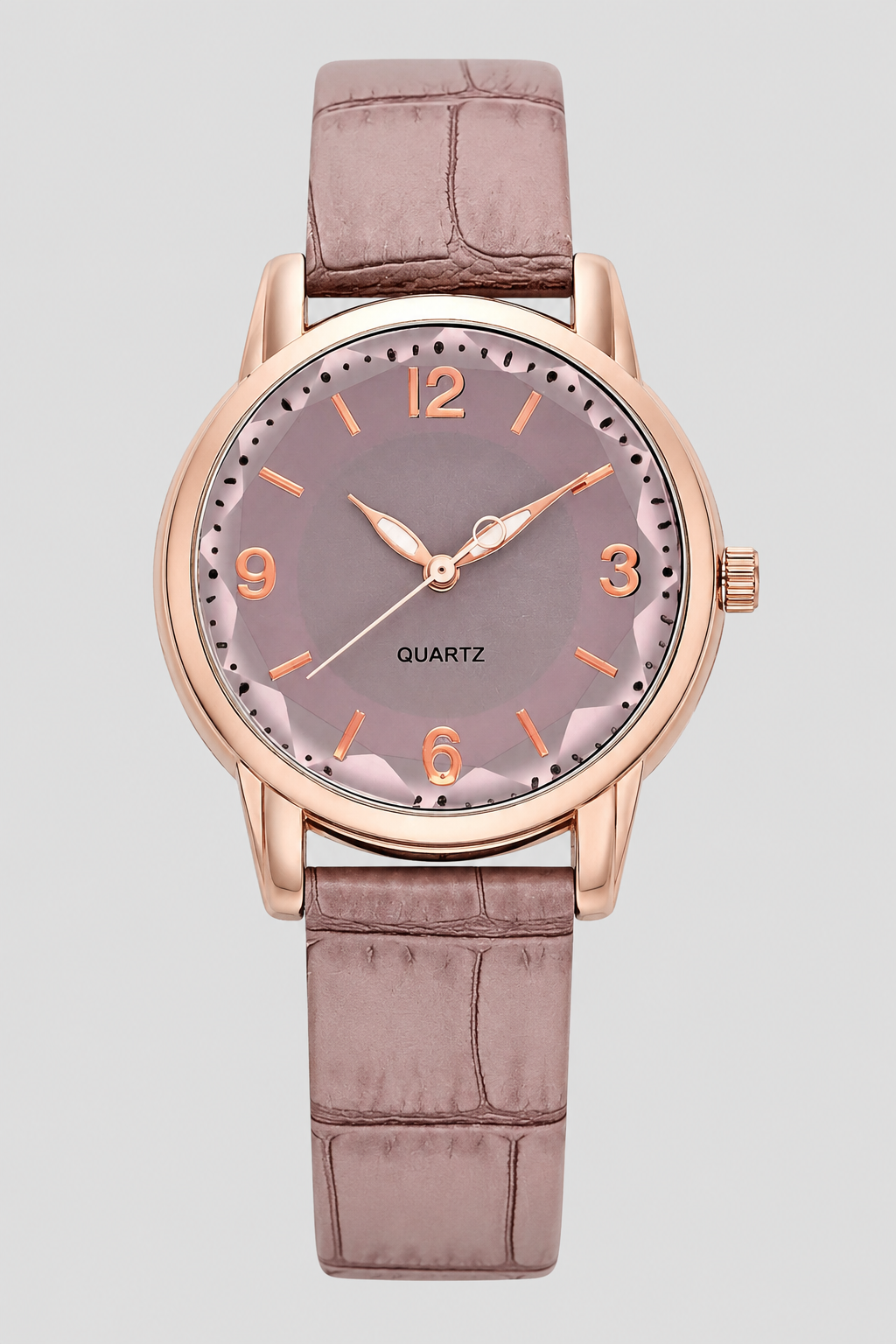 Elegant women's classic watch with a minimalist face and a stylish embossed strap, perfect for everyday wear.