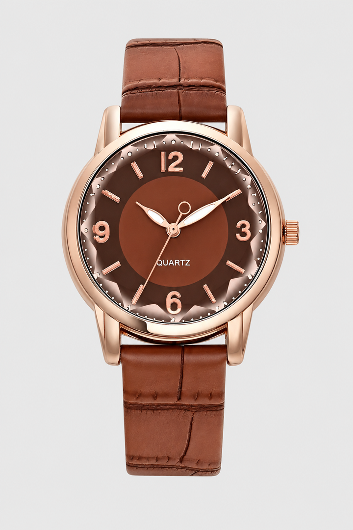 Minimalist women's quartz watch featuring a classic design and a sophisticated embossed strap, a chic fashion accessory.