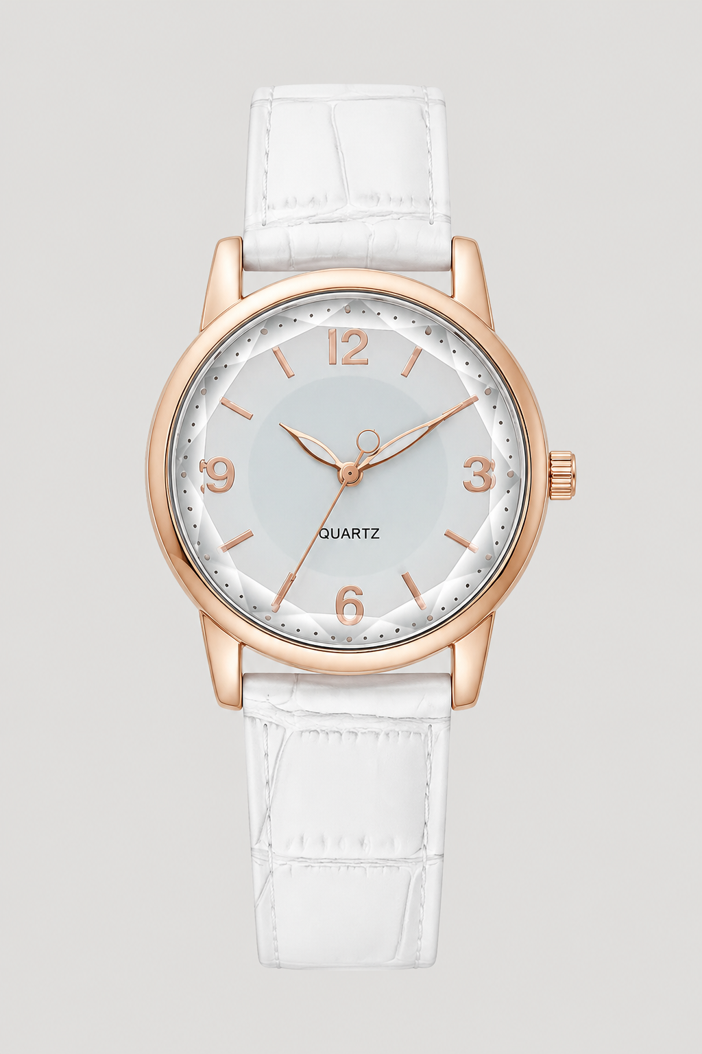 Fashionable women's classic watch, showcasing a clean minimalist dial and an exquisitely embossed strap. Elegant timepiece.