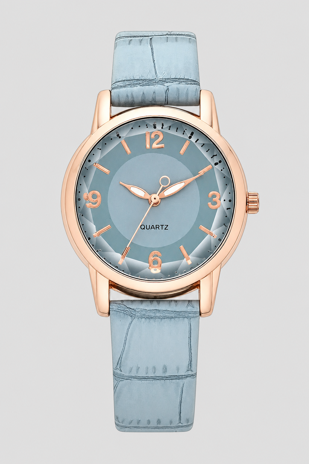 Versatile women's classic watch with a minimalist aesthetic and a unique embossed strap, suitable for any occasion.