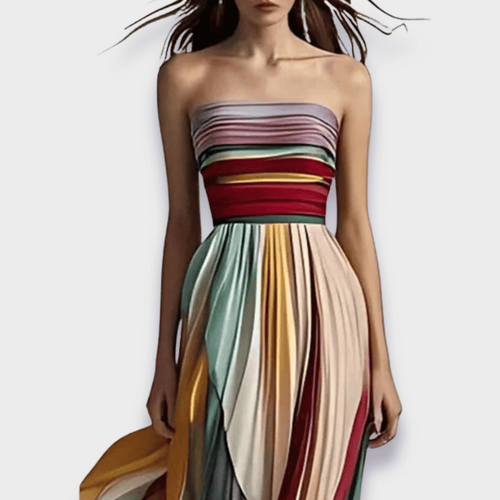Maxi dress, colorblock design, pleated skirt & strapless top for an elegant women's event.