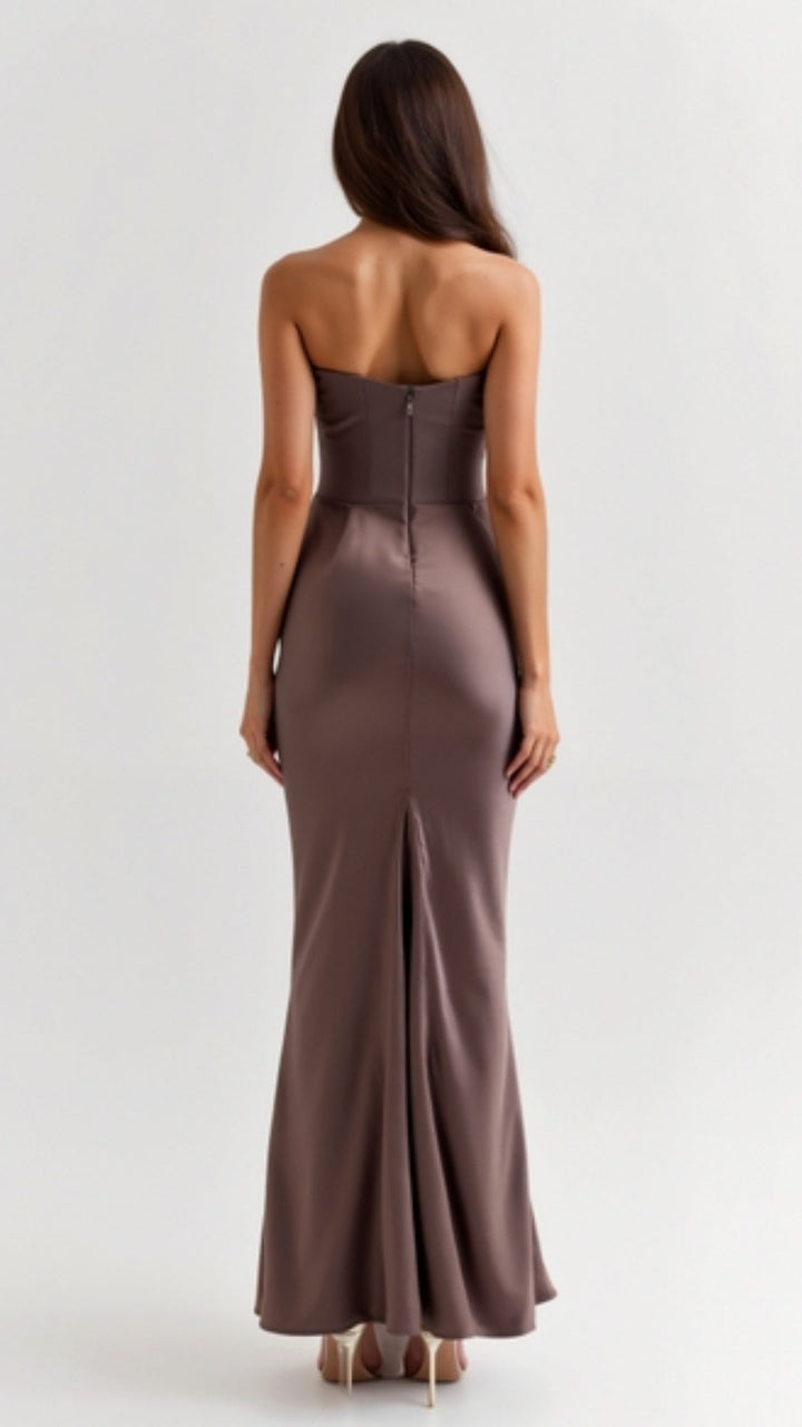 Close-up of the fabric texture on an elegant women's column maxi dress, perfect for weddings.