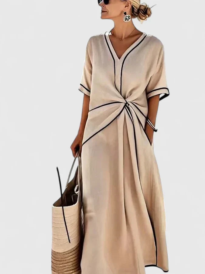Comfortable women's twist front maxi dress with contrast trim, offering a flattering fit & summer style.