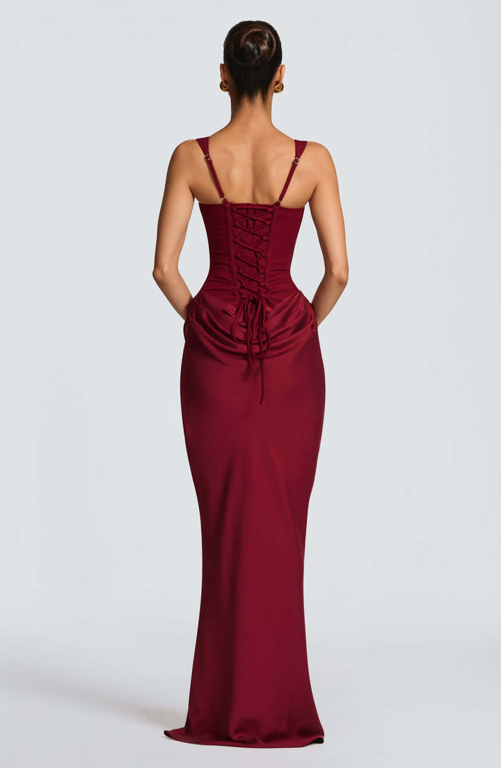 Women's formal party dress, a floor-length evening gown with a trendy corset and elegant design.