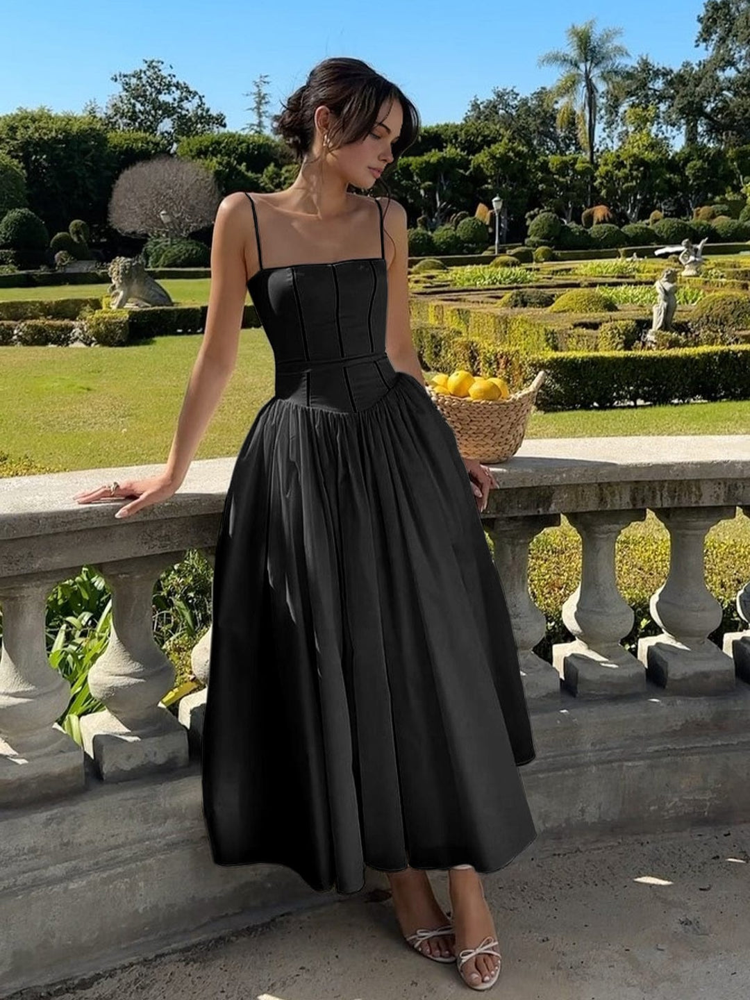 Chic women's sleeveless midi dress featuring a corset design, great for special occasions.