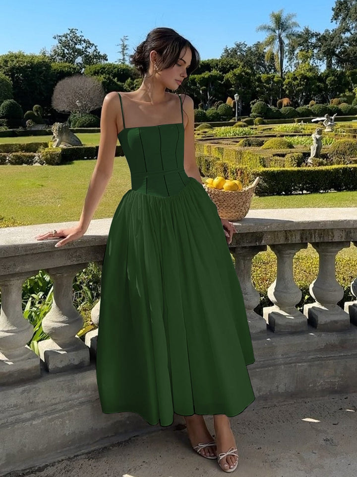 Wedding guest midi dress for women, with a flattering corset top, elegant and formal.