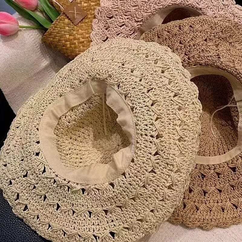 Women's fashion hat: a crochet straw sun hat with an elegant ruffle for a sophisticated look.