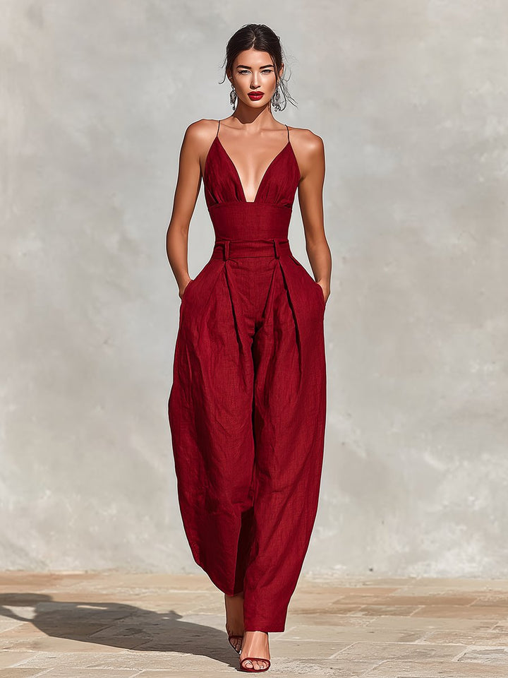 Chic red deep V-neck sleeveless wide leg formal jumpsuit, perfect for wedding guests & dinner.