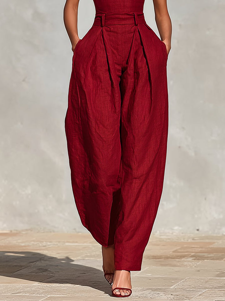Women's elegant relaxed fit deep V-neck wide leg jumpsuit, ideal for formal events & parties.