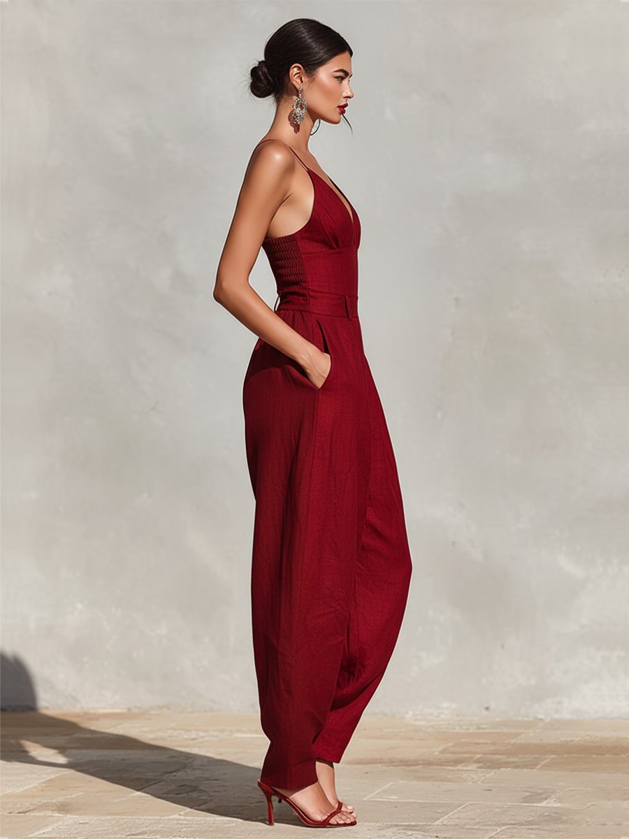 Formal deep V-neck jumpsuit for women, featuring a wide leg & sleeveless design, perfect for galas.
