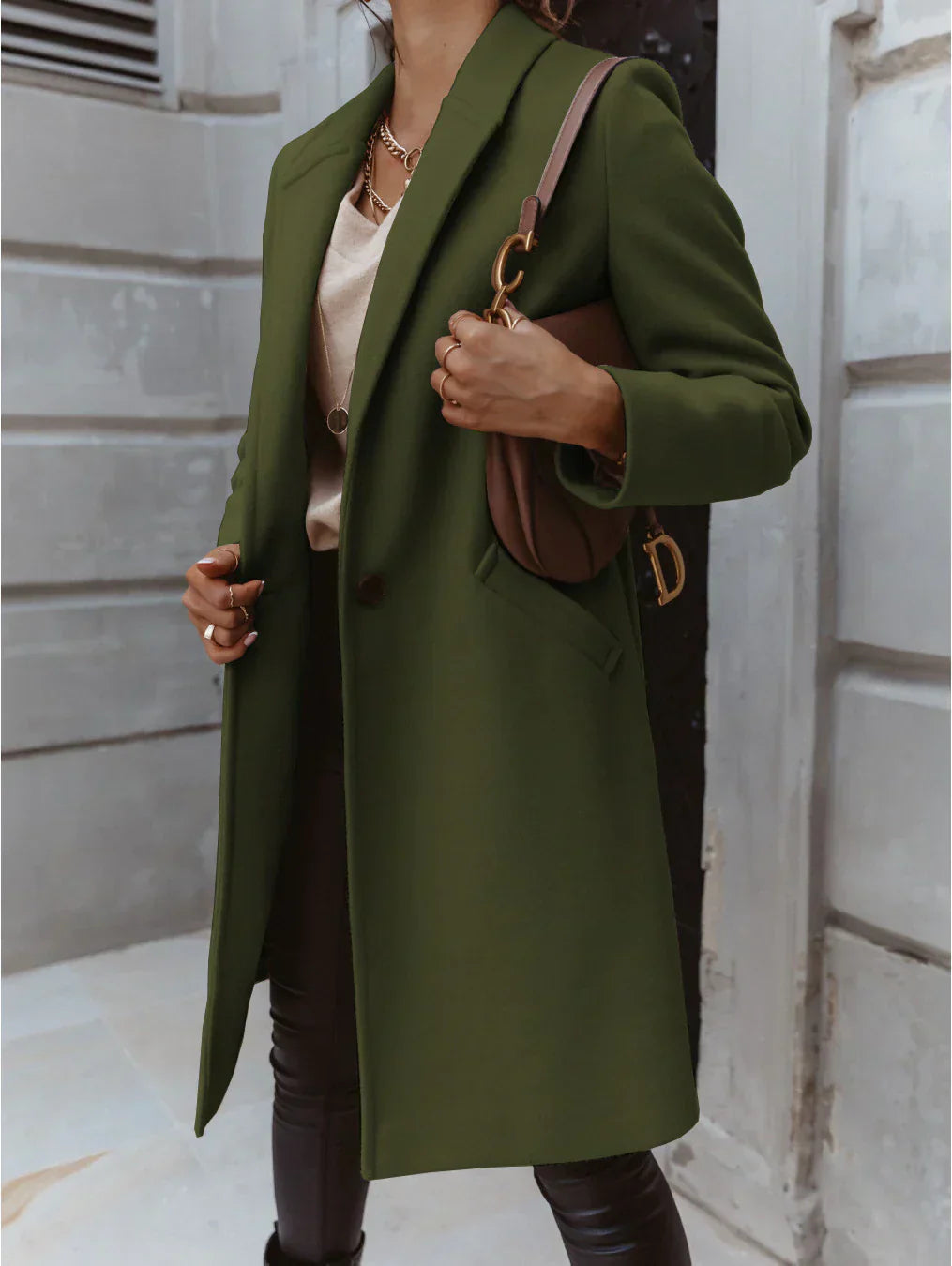 Women's fashion a-line long trench coat in beige, showcasing its double-breasted style.