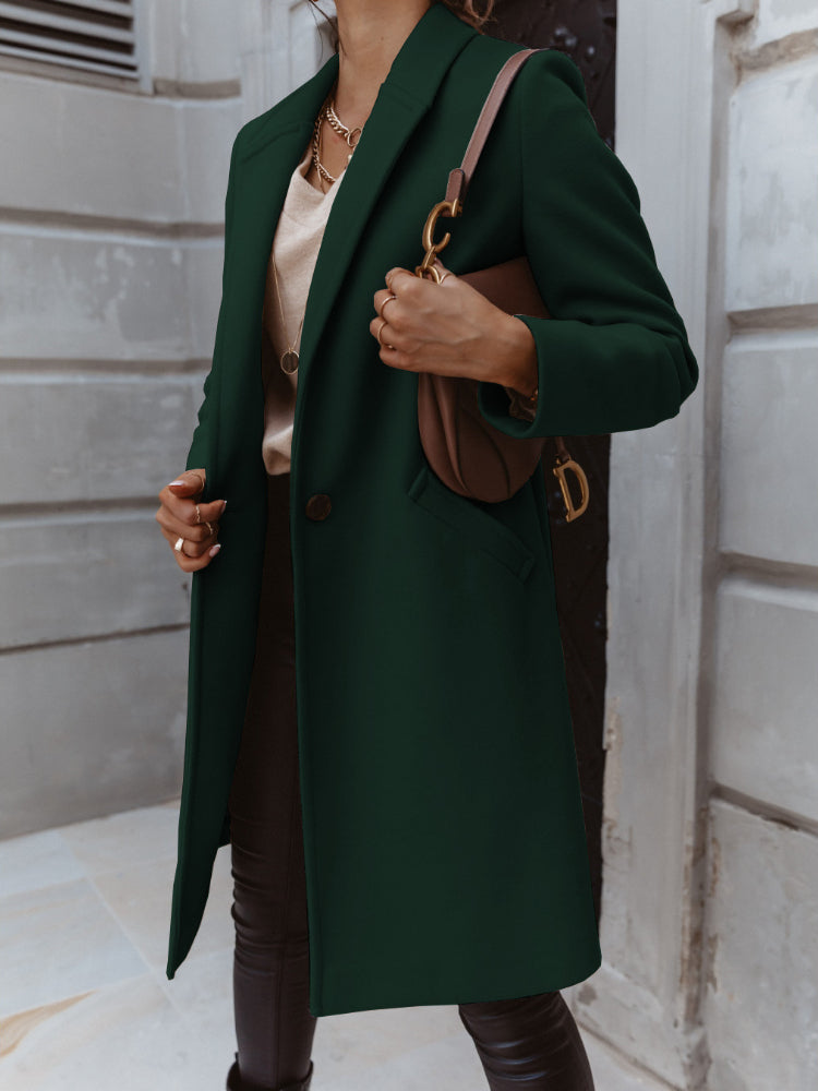 Beige double-breasted long trench coat for women, a timeless and elegant outerwear piece.