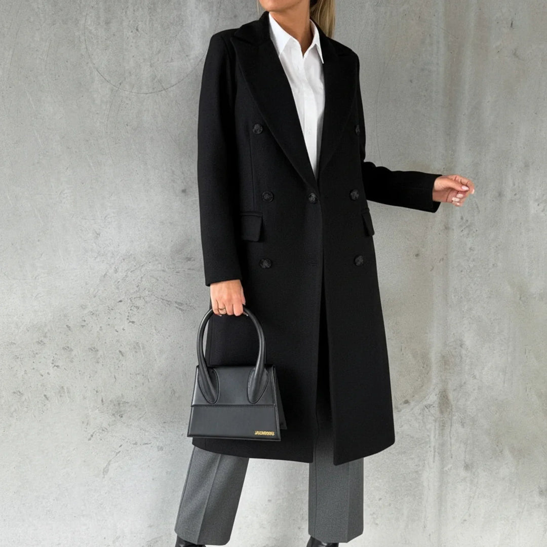 Elegant women's double-breasted long winter coat. Classic design offers chic, warm outerwear for fall & winter.