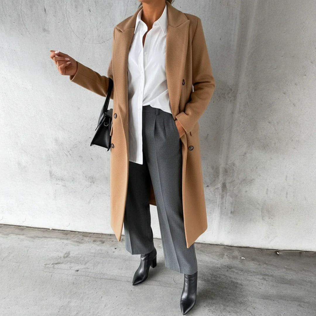 Classic women's double-breasted long winter coat. Elegant, warm outerwear for a sophisticated fall & winter look.