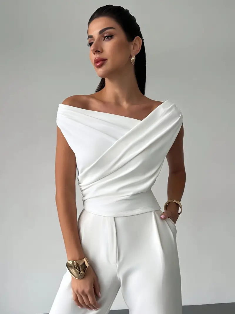 Elegant women's draped shoulder top, perfect for evening or office wear. Sophisticated style.