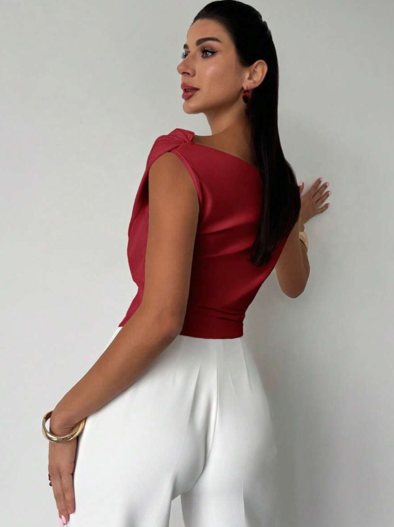 Chic women's elegant top with a graceful draped shoulder, perfect for making a stylish statement.