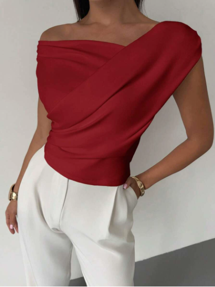 Sophisticated women's blouse featuring a unique draped shoulder design, versatile for any occasion.