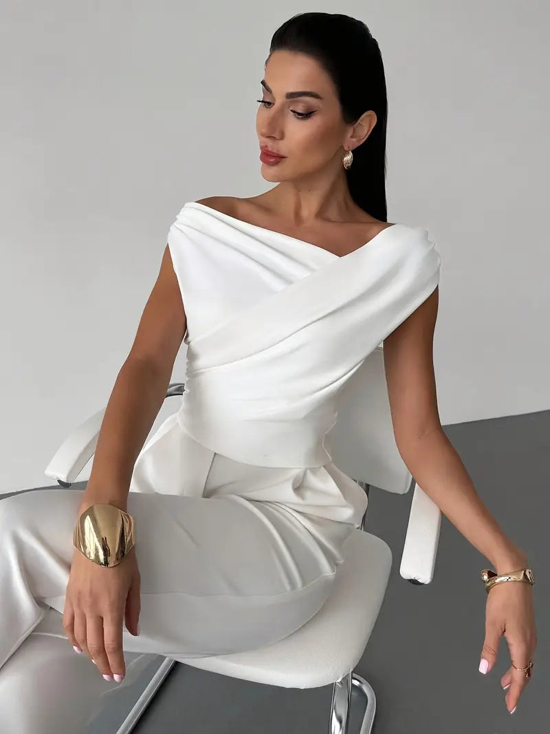Versatile women's top with a beautiful draped shoulder detail, perfect for sophisticated style.