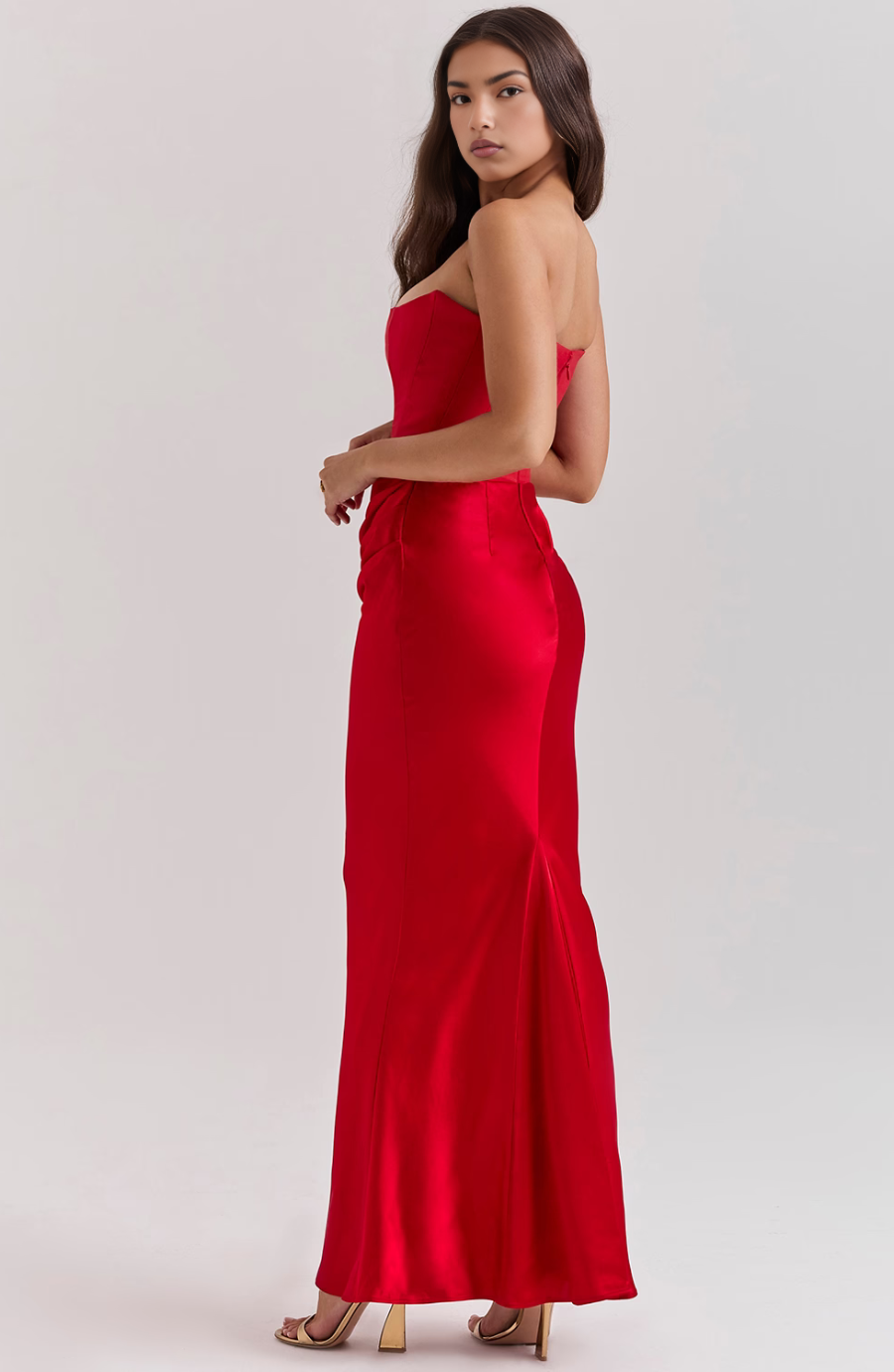 Eye-catching strapless party dress with tasteful draping, perfect for prom.