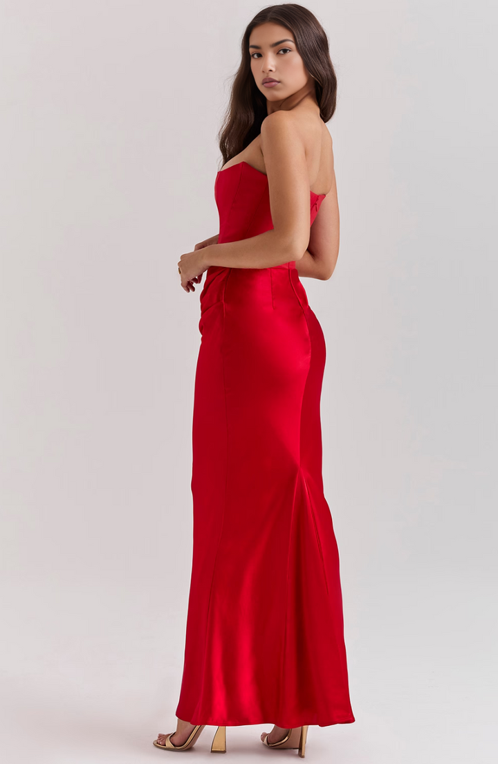 Eye-catching strapless party dress with tasteful draping, perfect for prom.
