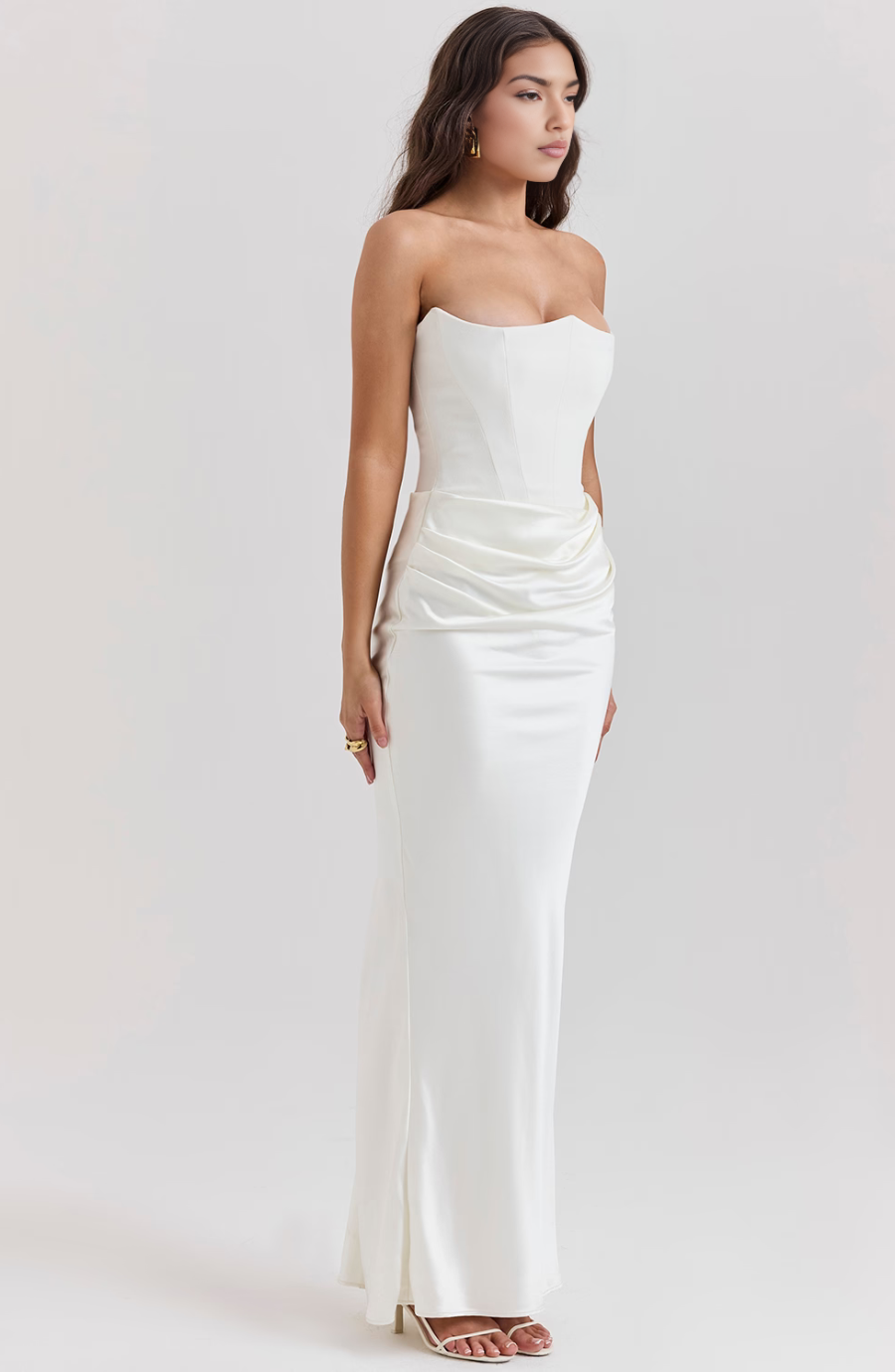 Stylish strapless column dress for women, featuring an elegant draped design.