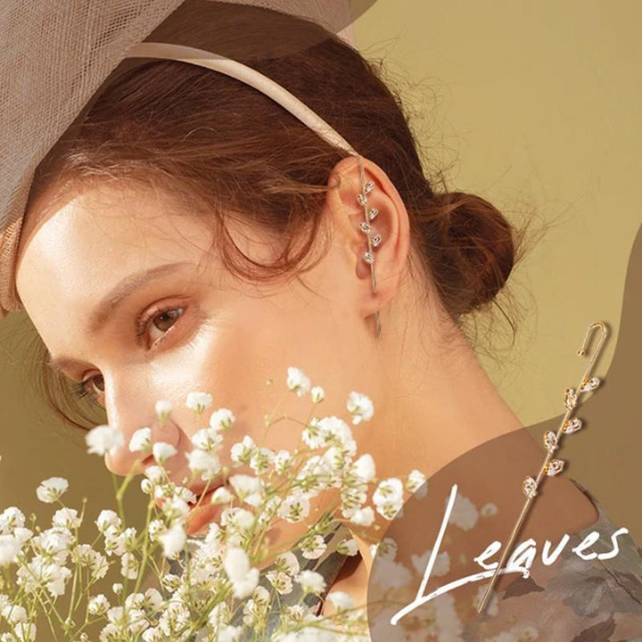 Stylish women's ear wrap crawler, silver-tone and rhinestone, adds a touch of glamour to any outfit. Product shot.