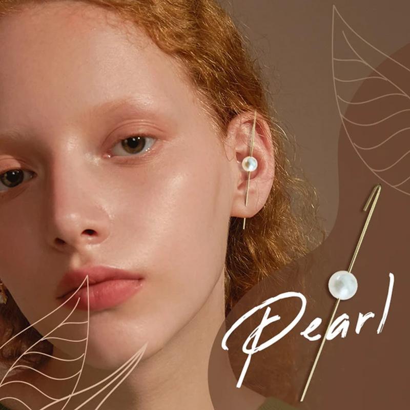 Delicate women's ear wrap crawler earring, gold-tone metal with multiple small rhinestones for subtle elegance.