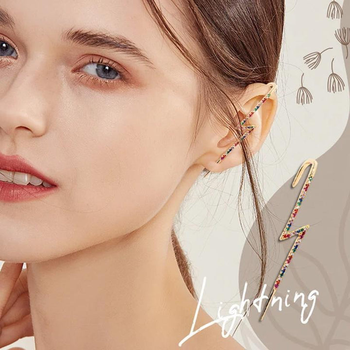 Stylish women's ear crawler earring, shimmering rhinestone design, perfect for fashion-forward women. Close-up.