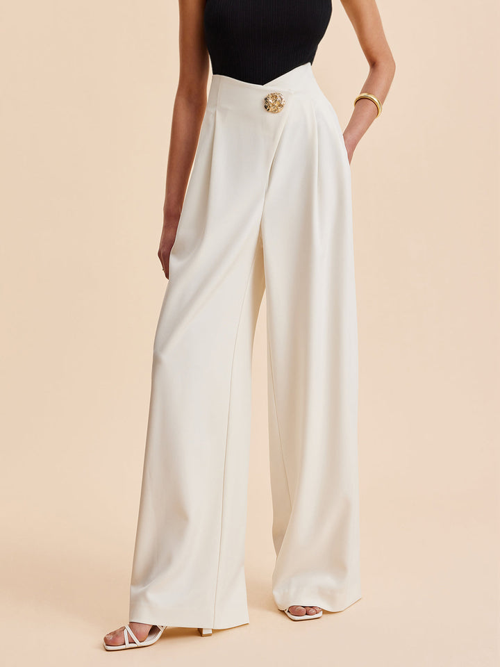 Elegant women's embellished high-waist wide-leg pants. Fashionable, sophisticated, and comfortable for work or casual wear.