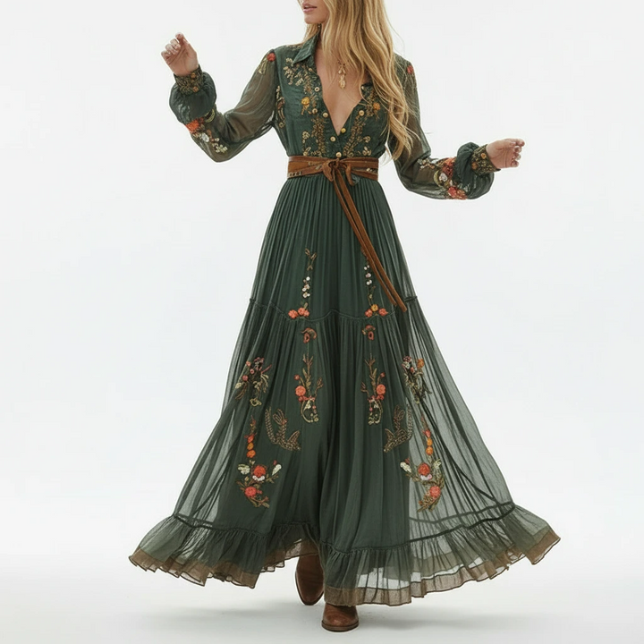 Elegant women's embroidered long sleeve boho maxi dress with flowing fabric and delicate floral patterns.