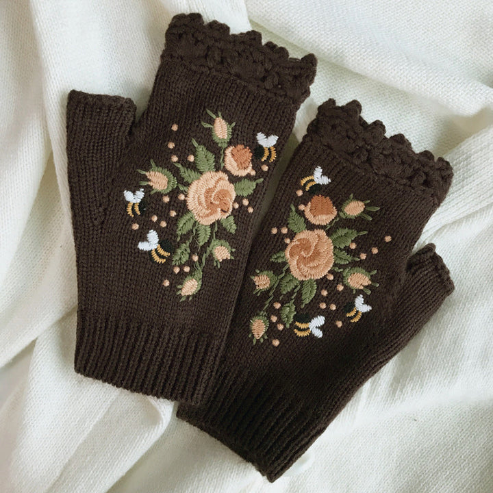 Women's warm winter gloves with embroidered details, providing both style and essential cold weather protection.