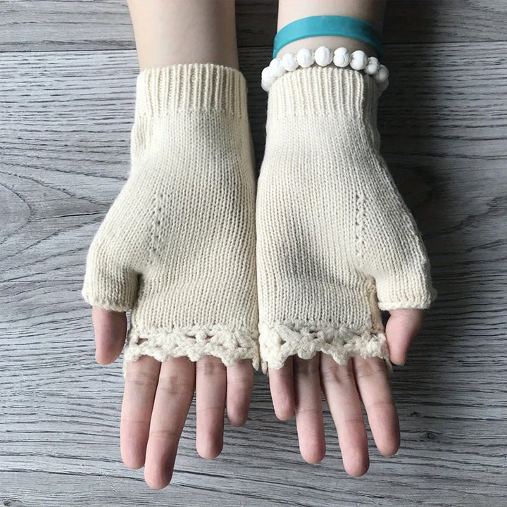 Warm acrylic women's gloves with beautiful embroidery, essential for winter fashion and cold protection.