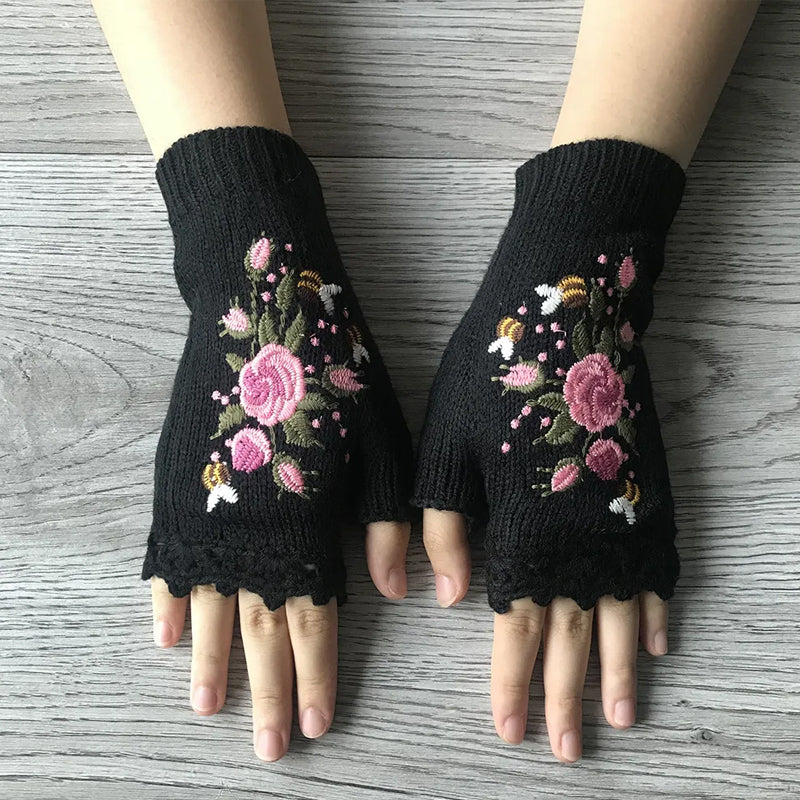 Stylish black women's embroidered winter gloves, a luxurious accessory for fall and winter outfits.