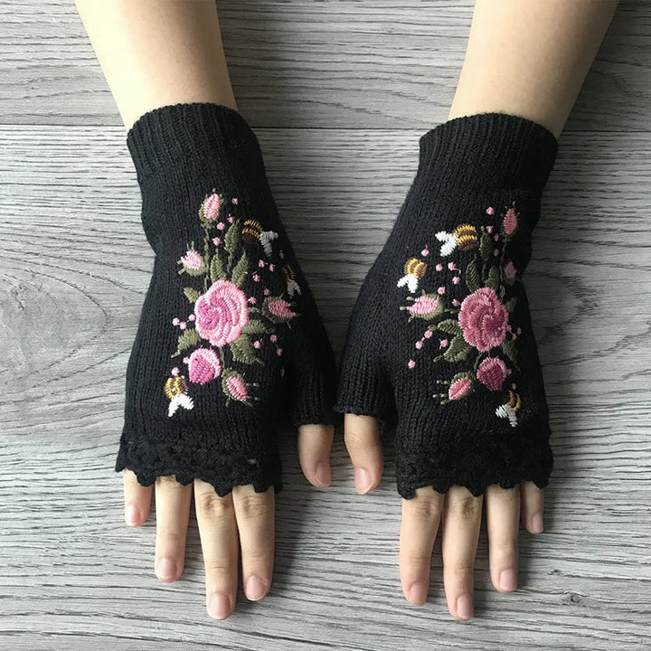 Stylish black women's embroidered winter gloves, a luxurious accessory for fall and winter outfits.