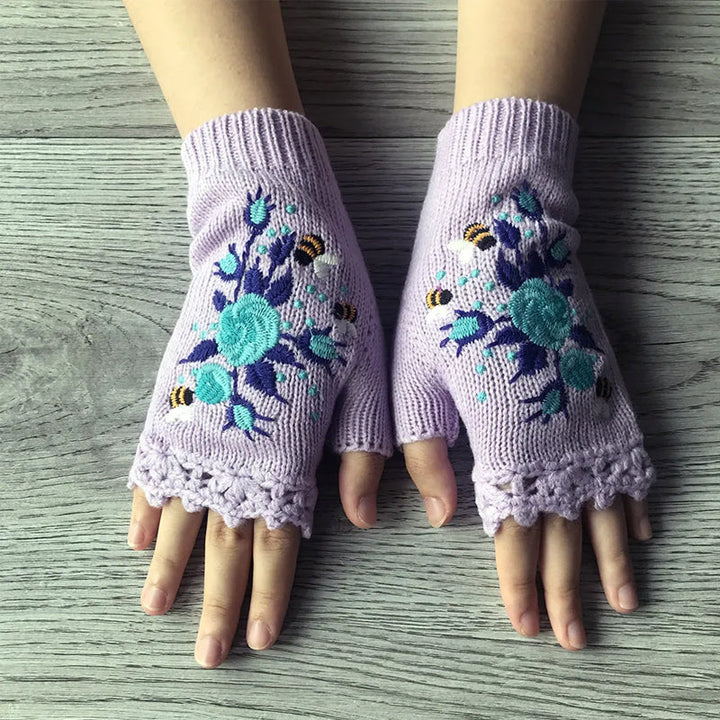 Women's embroidered winter gloves, crafted from warm acrylic, offering elegance and comfort against the cold.