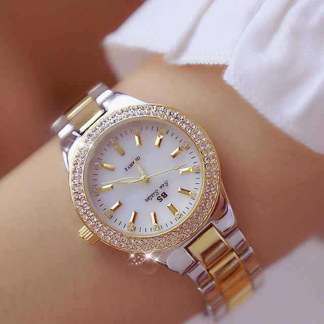 Stylish Esmée ladies' fashion watch. A classic two-tone quartz timepiece with an elegant round dial for everyday wear.