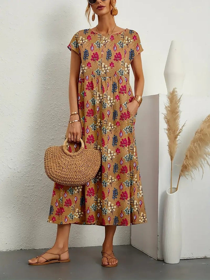 Chic women's short-sleeve A-line floral dress with practical pockets, ideal for a stylish, comfortable look.
