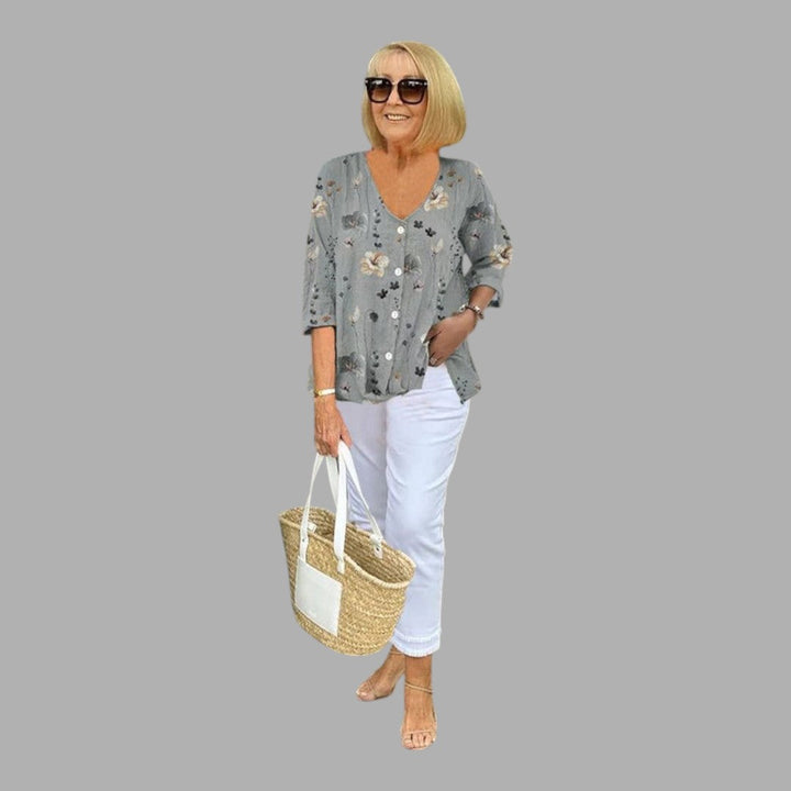 Refined women's floral top, a semi-formal long sleeve blouse for an elegant and stylish appearance.
