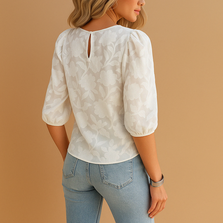 Versatile women's floral blouse for elegant casual or formal wear. Feminine and chic style.