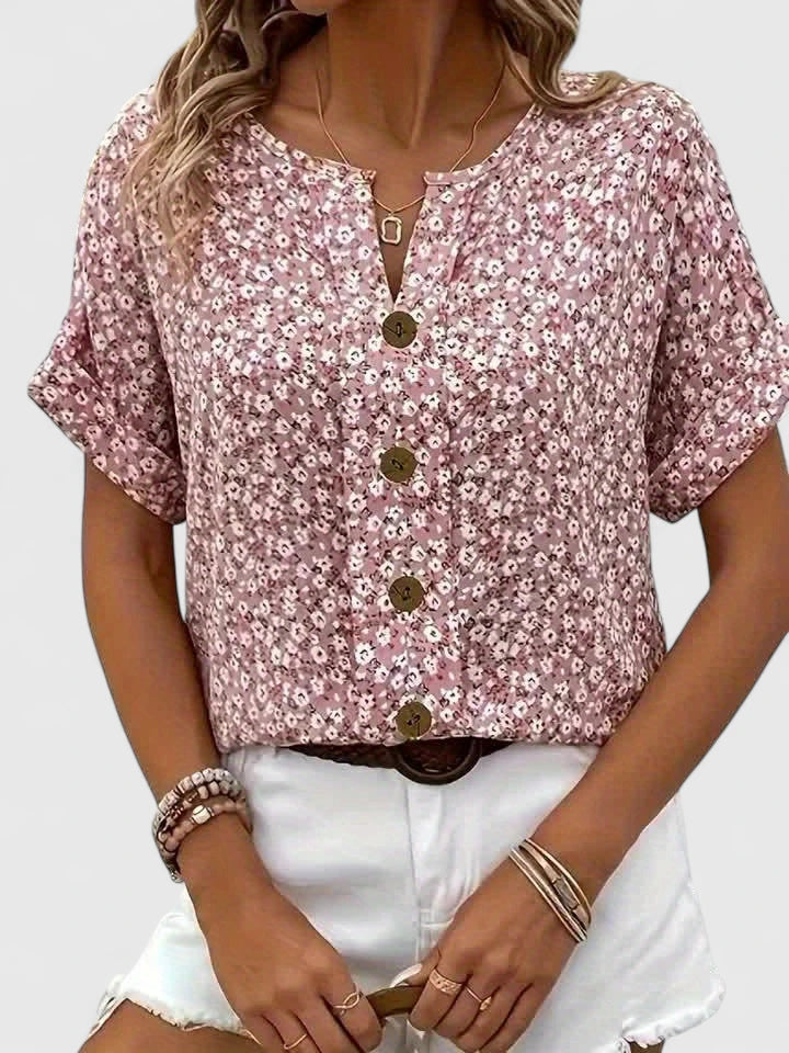 Chic women's floral button-up blouse. A comfortable, long sleeve top for elegant casual wear in spring and summer style.