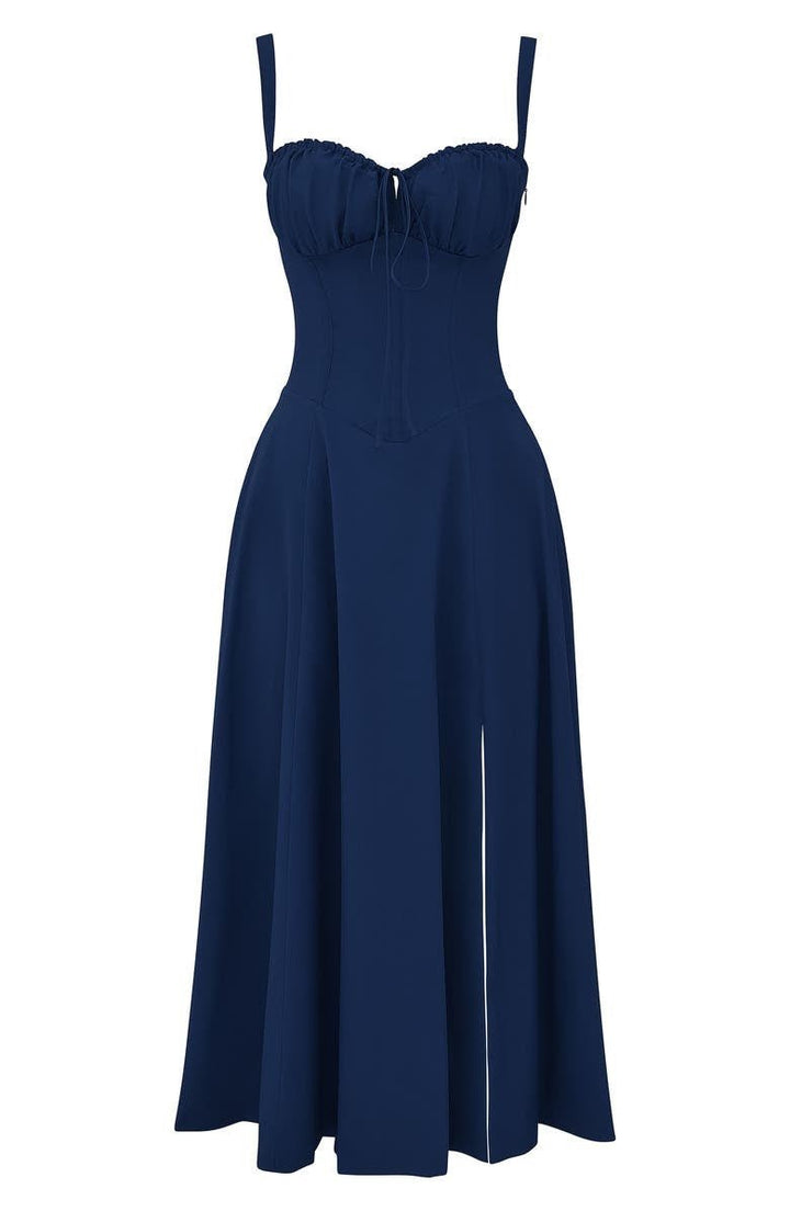 Flowing hemline of a women's floral midi dress, adding to its elegant silhouette