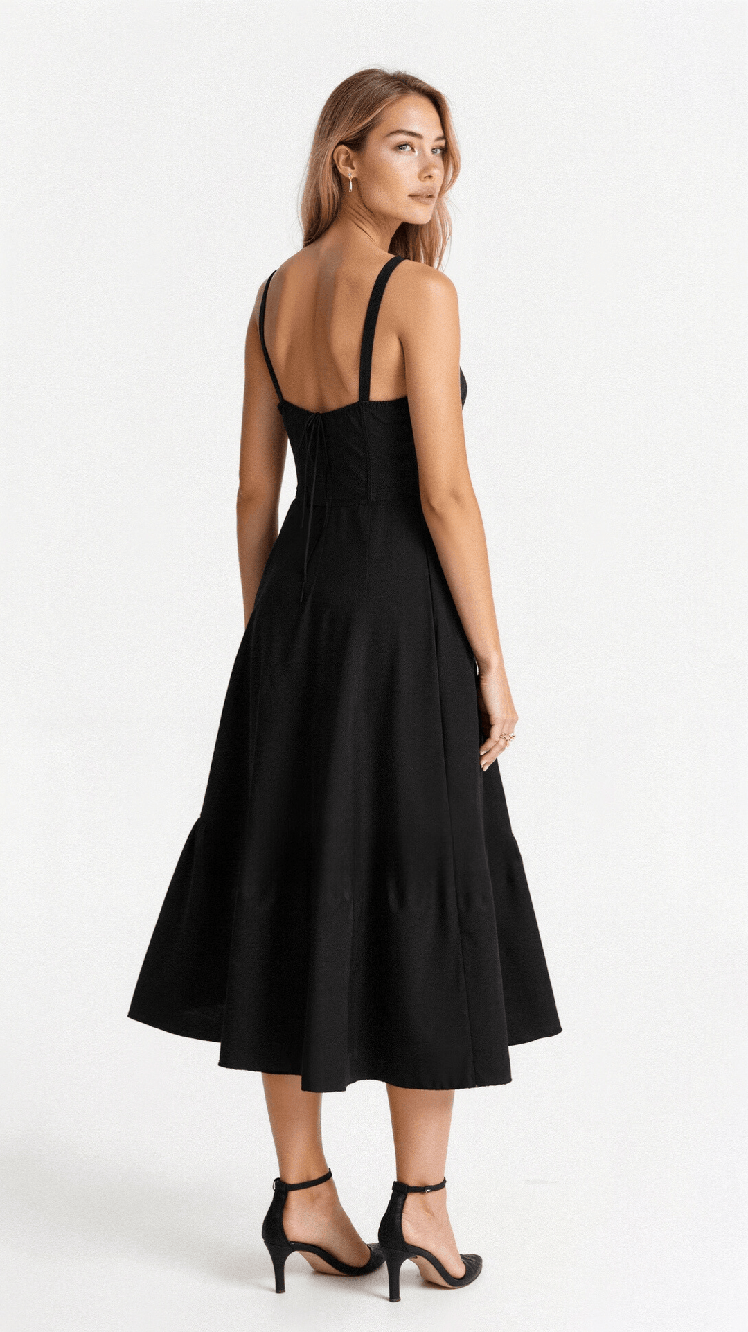 Side view of a women's floral midi dress, showcasing its elegant flowing silhouette