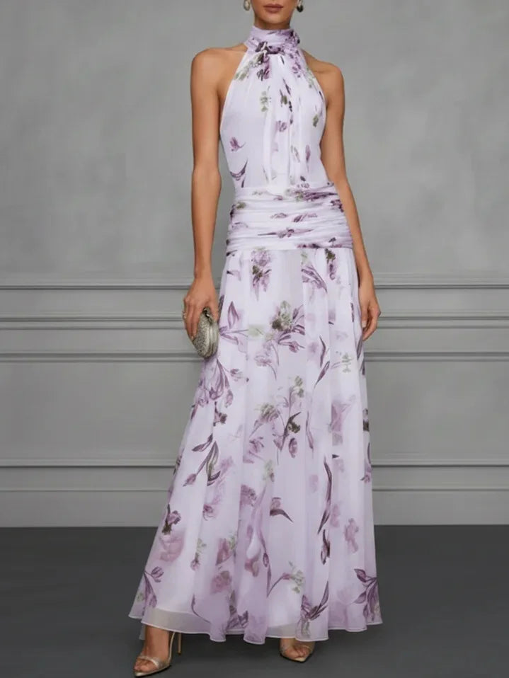 Chic women's floral halter maxi dress. Elegant design with flowy silhouette, great for formal events & summer parties.