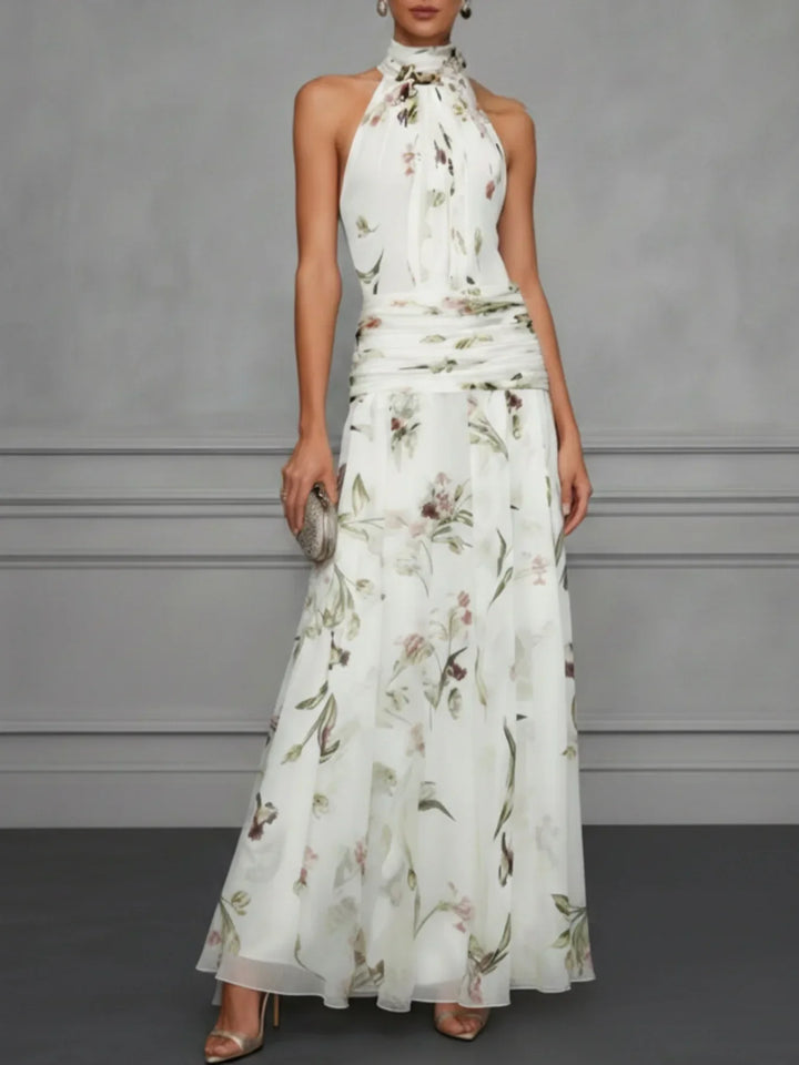 Vibrant floral halter maxi dress for women. Summer-ready design, perfect for elegant events & gatherings.