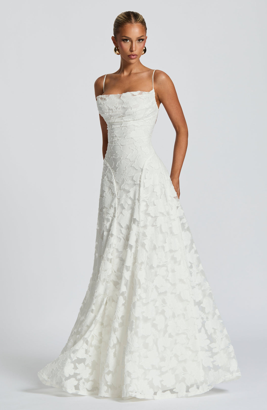 Women's stunning floral jacquard maxi dress, perfect for a formal wedding guest outfit.